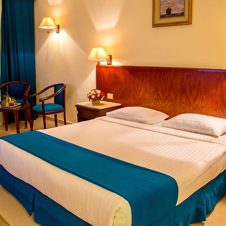 Serenity Alpha Beach - Ex Serenity Makadi Beach Kültér fotó A bedroom in a hotel