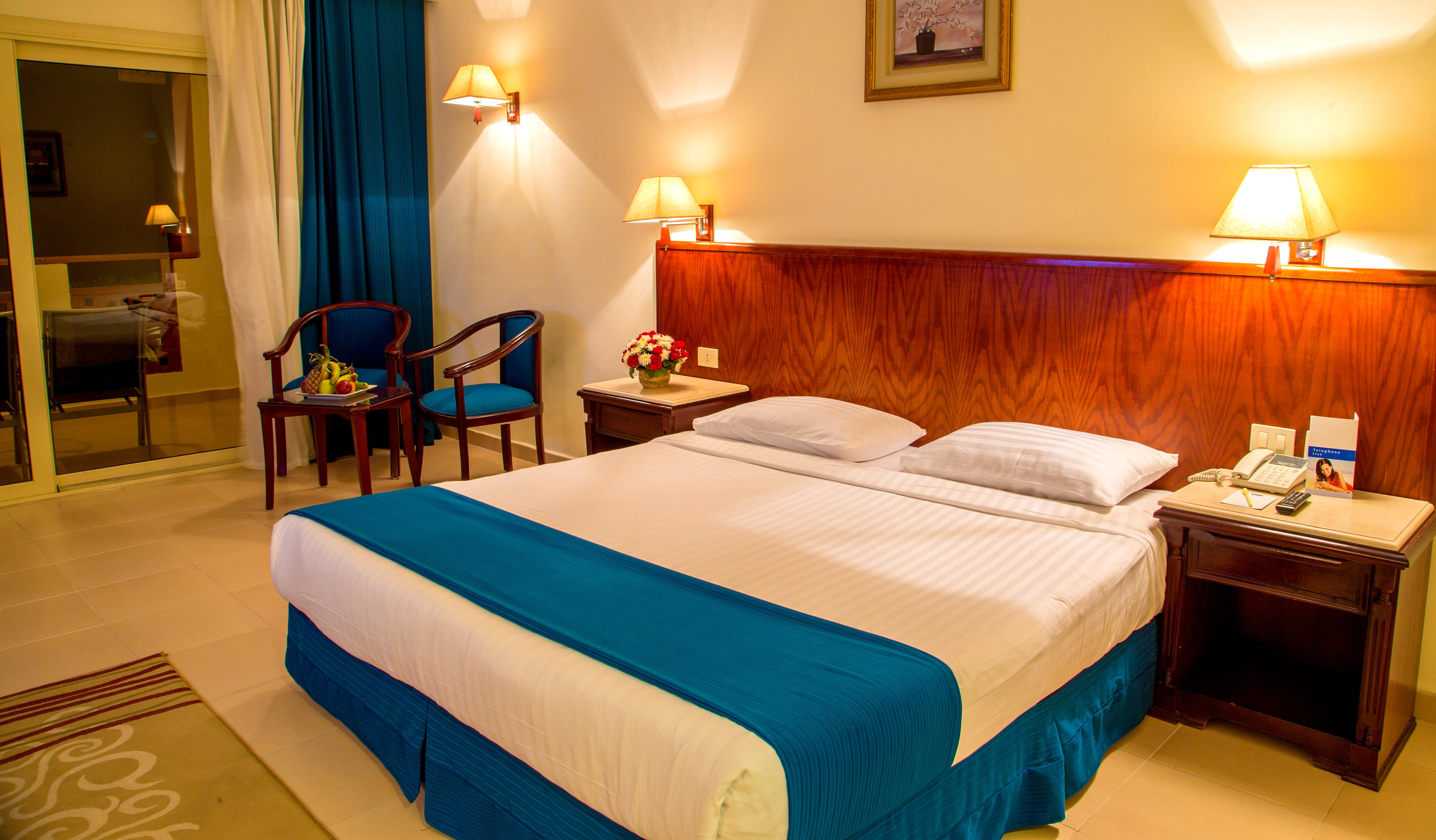 Serenity Alpha Beach - Ex Serenity Makadi Beach Kültér fotó A bedroom in a hotel